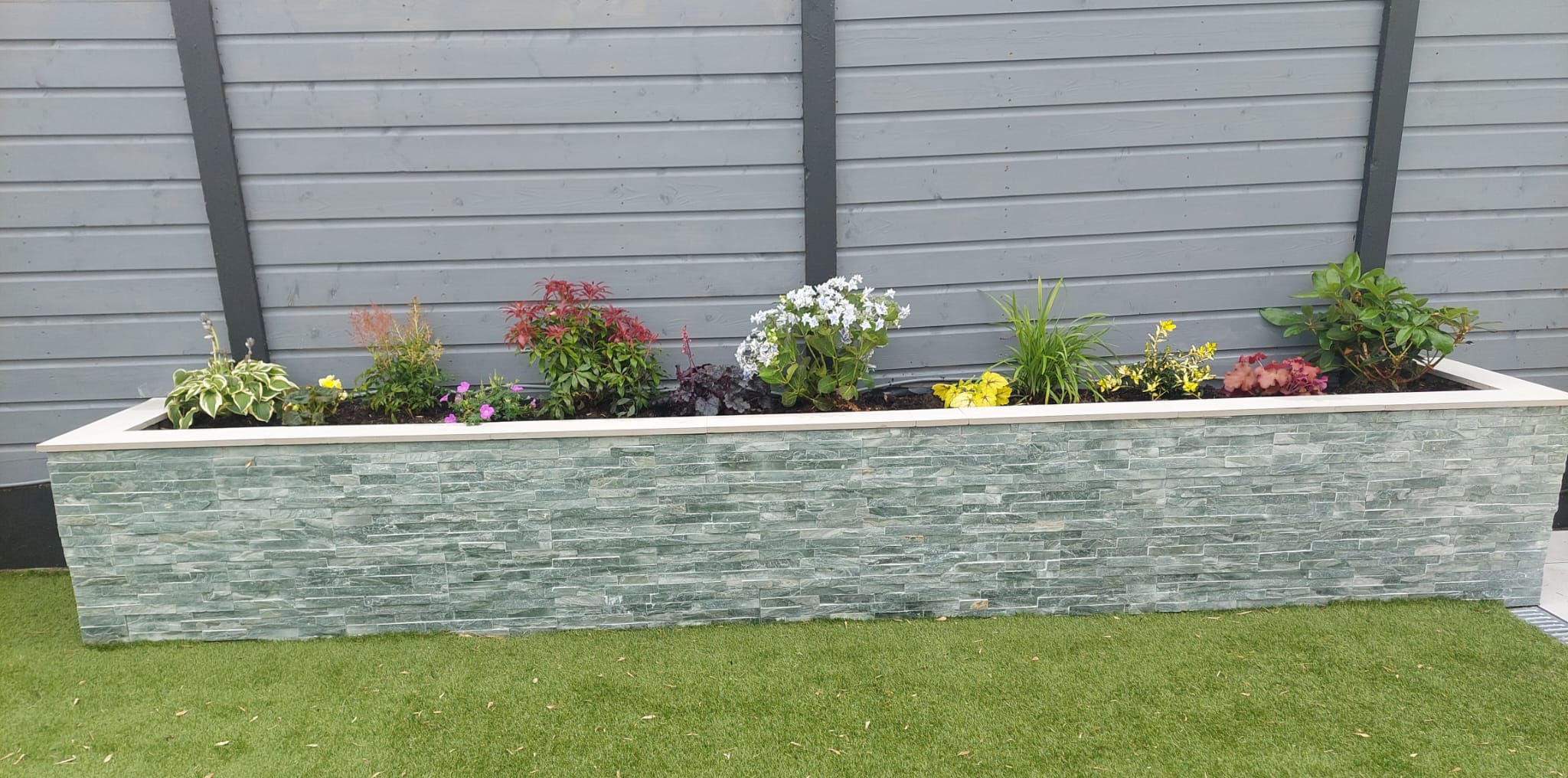 Flower bed built with tiles