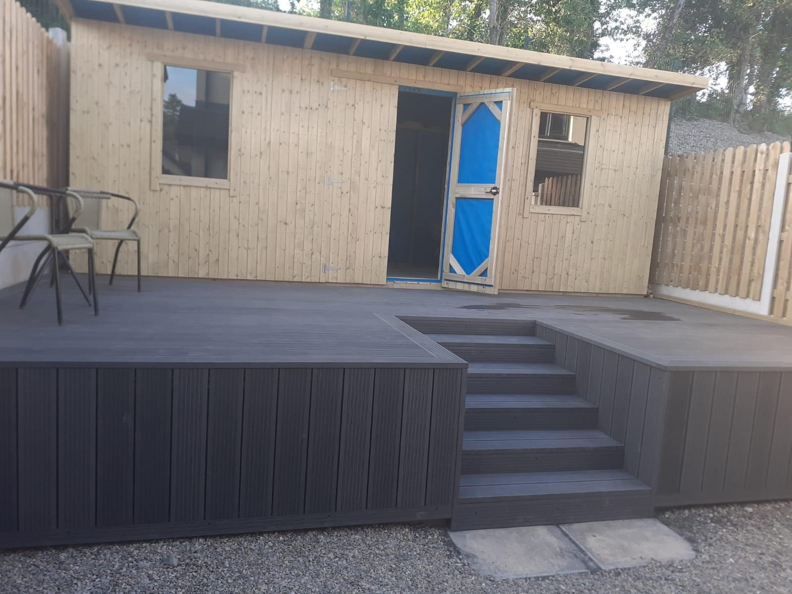 Composite decking with garden summer house