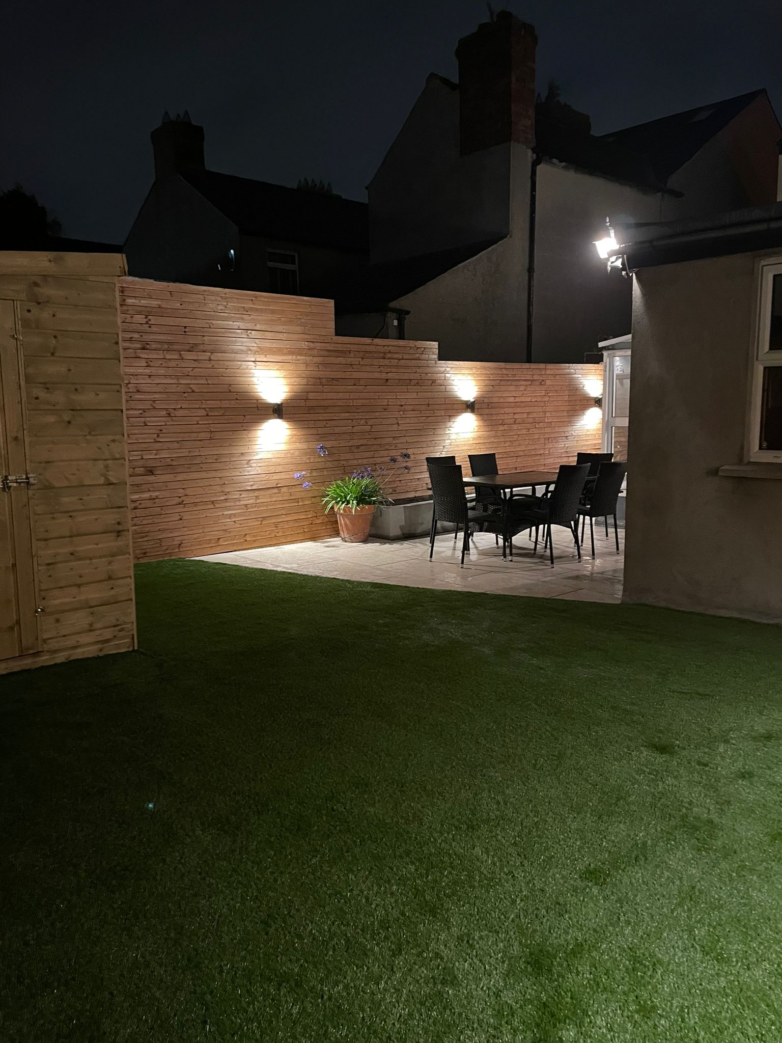 Custom built fence with spotlights