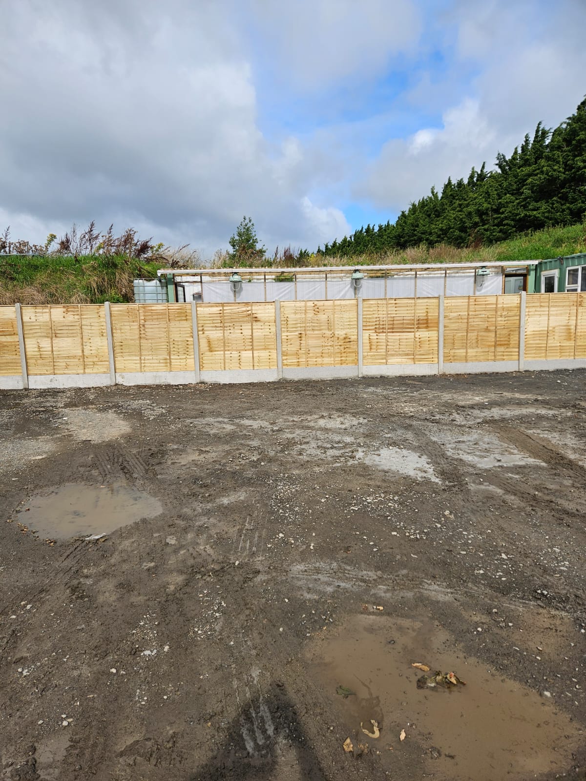 Long hand crafted garden fence