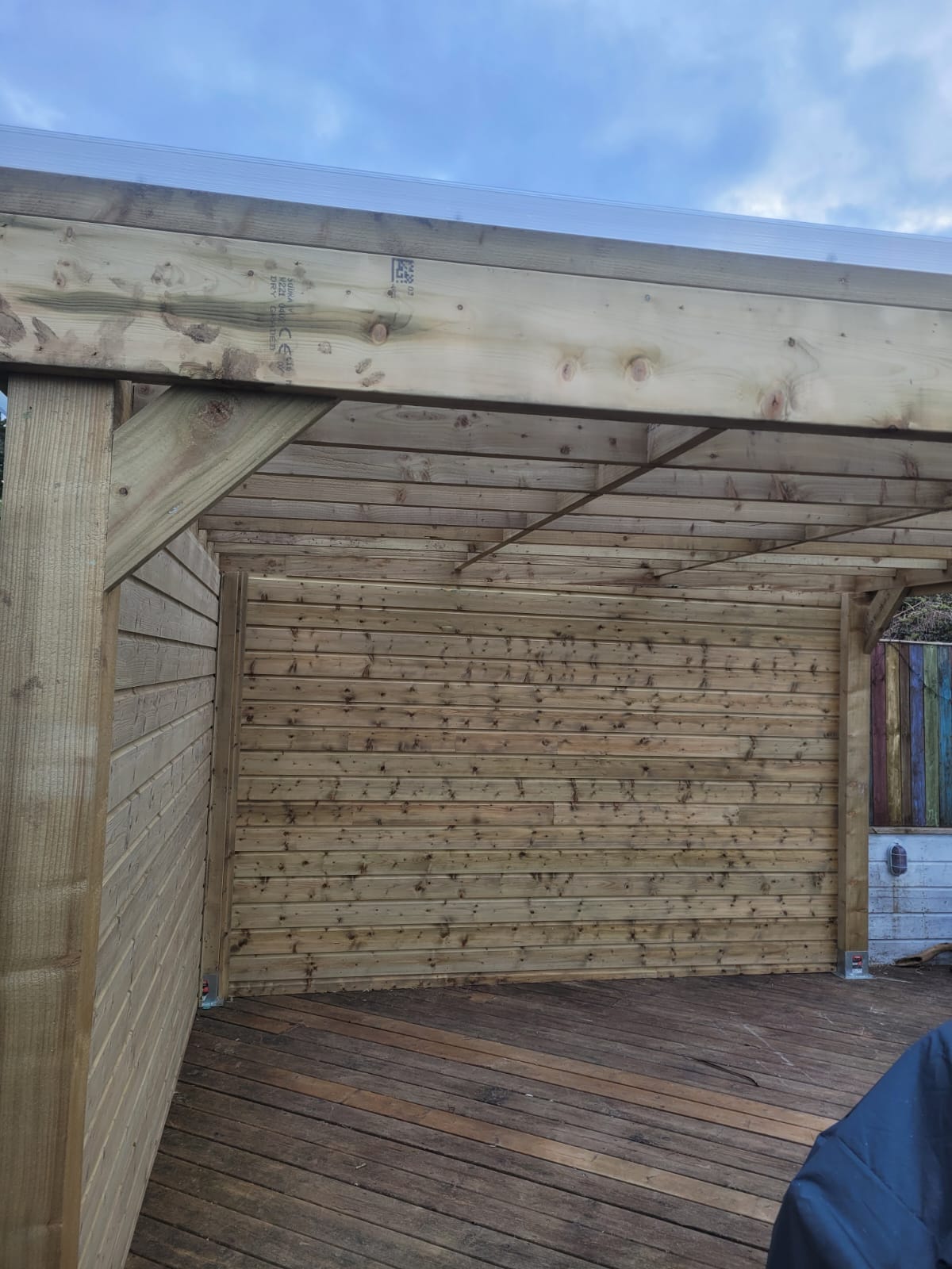 Garden fence and pergola with plastic roof