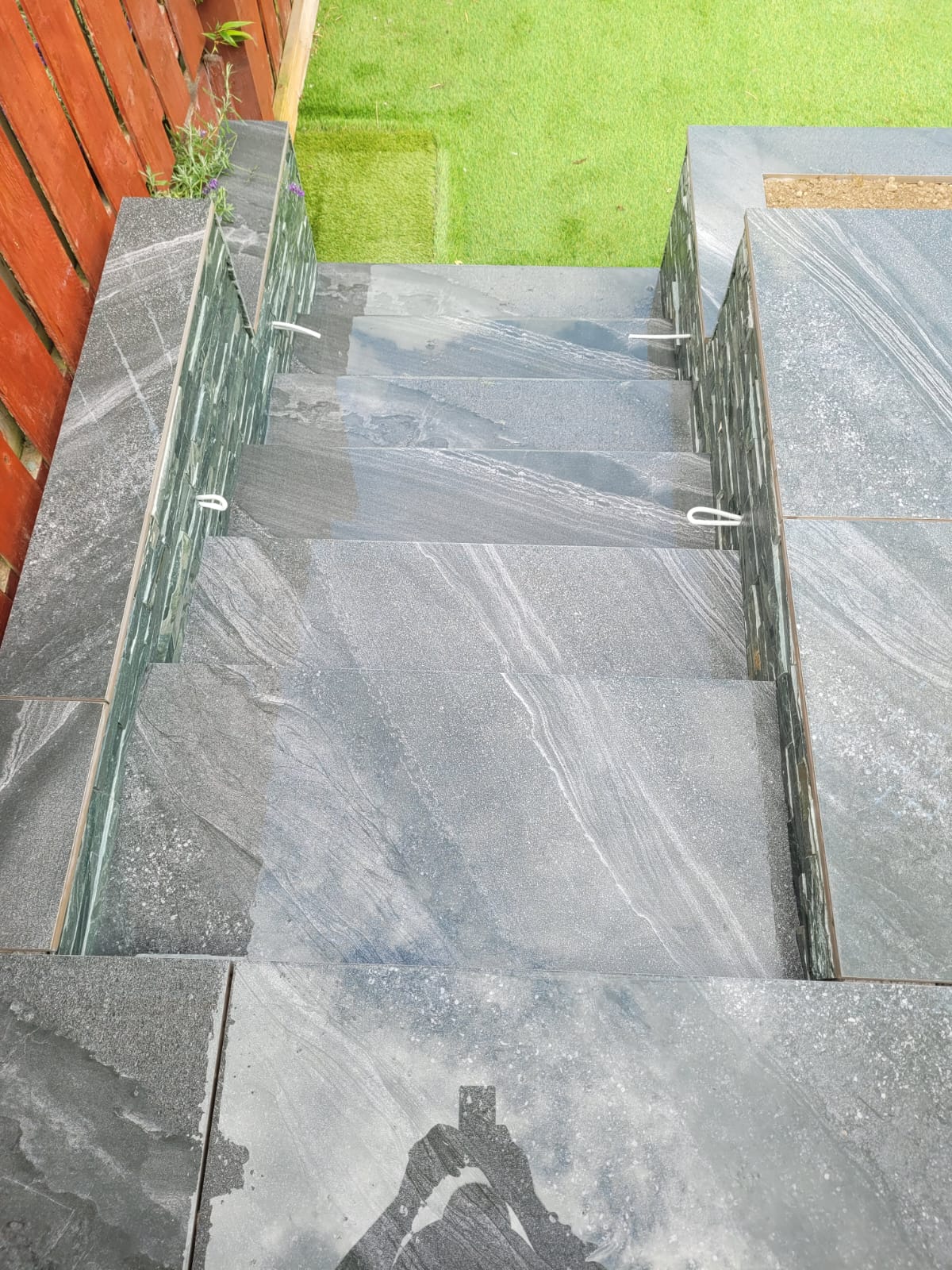 Stairs of a patio built with gloss tiles