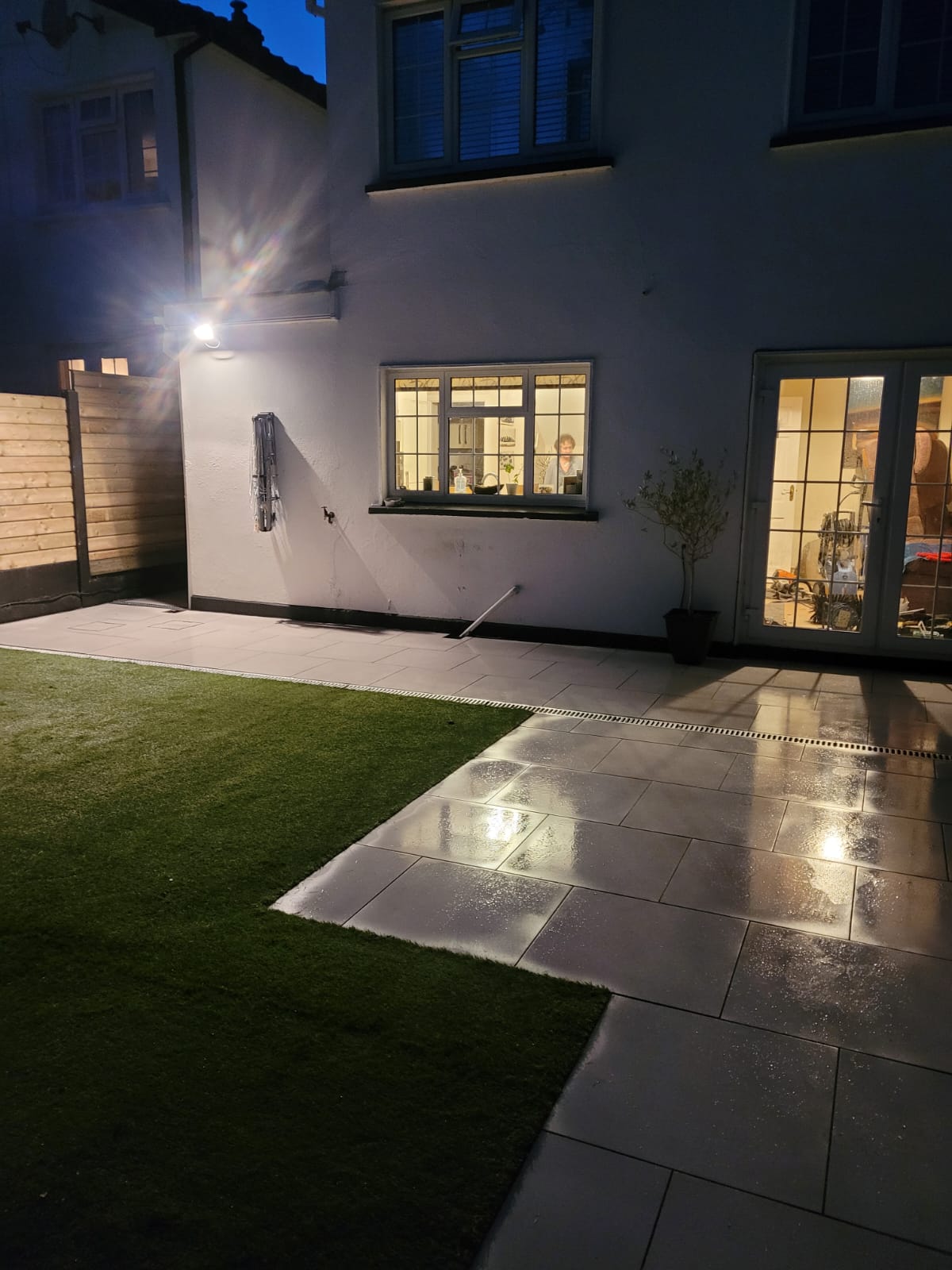 Paving and artficial grass laid on a back garden